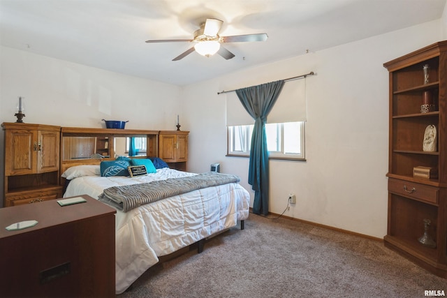 2505 26th Avenue Ct Unit J, Rock Island, IL 61201 - carpeted bedroom featuring baseboards and a ceiling fan