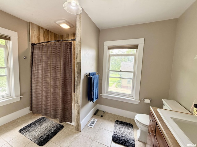 101 S Stewart St, Geneseo, IL 61254 - bathroom with healthy amount of natural light, tile patterned floors, and a shower with shower curtain