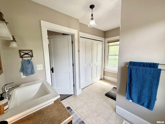 101 S Stewart St, Geneseo, IL 61254 - bathroom with tile patterned flooring and a sink