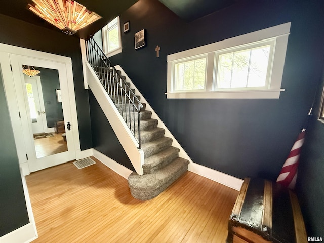 101 S Stewart St, Geneseo, IL 61254 - stairway featuring wood finished floors and baseboards
