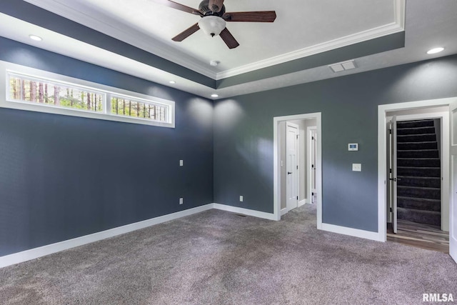 3972 Baptist Camp Rd, Carterville, IL 62918 - carpeted spare room featuring a tray ceiling, crown molding, a ceiling fan, baseboards, and recessed lighting