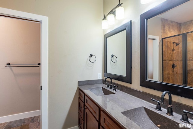 3972 Baptist Camp Rd, Carterville, IL 62918 - full bathroom with baseboards, a shower stall, and double vanity