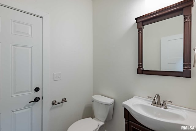 3972 Baptist Camp Rd, Carterville, IL 62918 - half bathroom featuring vanity and toilet