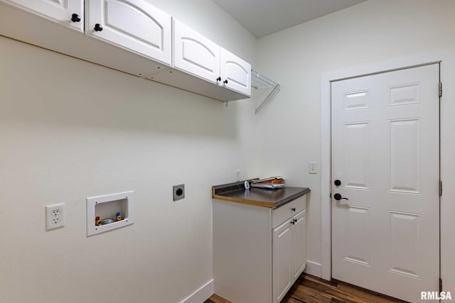 3972 Baptist Camp Rd, Carterville, IL 62918 - laundry room with hookup for an electric dryer, cabinet space, washer hookup, dark wood-type flooring, and baseboards