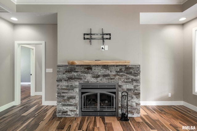 3972 Baptist Camp Rd, Carterville, IL 62918 - detailed view of wood finished floors, baseboards, crown molding, a fireplace, and recessed lighting
