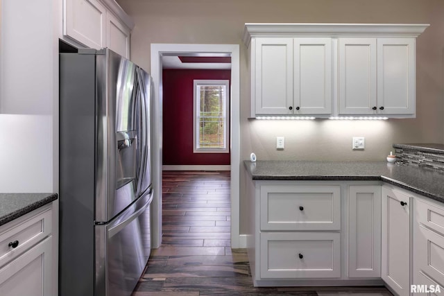 3972 Baptist Camp Rd, Carterville, IL 62918 - kitchen with stainless steel fridge with ice dispenser, dark wood-type flooring, white cabinetry, and baseboards
