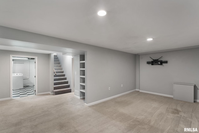finished basement with washer / clothes dryer, carpet floors, recessed lighting, stairway, and baseboards