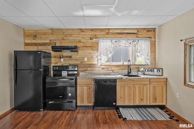 1709 Main St, Keithsburg, IL 61442 - kitchen with black appliances, a sink, wooden walls, dark wood-style flooring, and under cabinet range hood