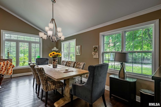 17503 N Woodlawn Ln, Woodlawn, IL 62898 - dining area with a chandelier, healthy amount of natural light, baseboards, crown molding, and dark wood-type flooring