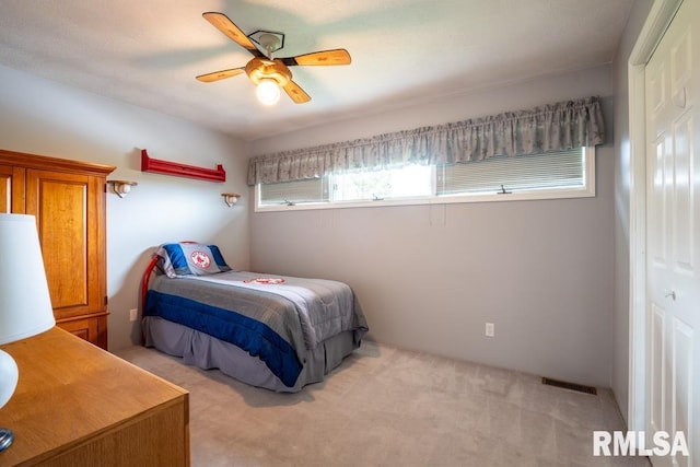12 Old Marion Rd, West Frankfort, IL 62896 - bedroom featuring light carpet and ceiling fan