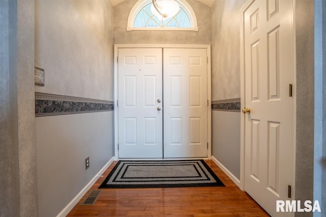12 Old Marion Rd, West Frankfort, IL 62896 - doorway featuring wood finished floors, baseboards, and vaulted ceiling