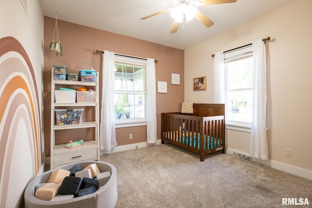 bedroom with carpet and baseboards