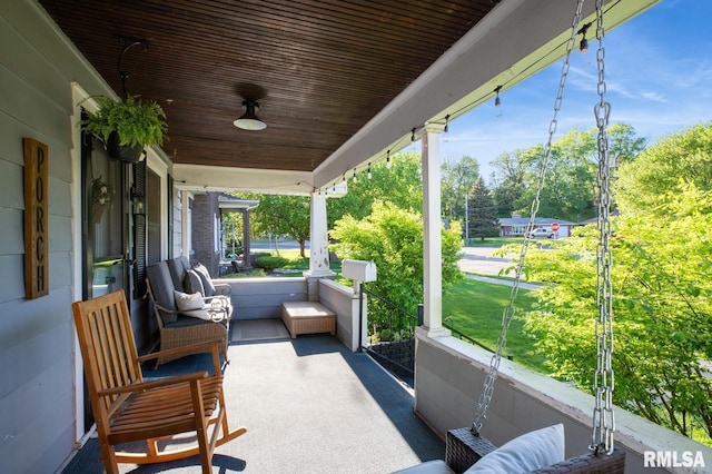 view of patio / terrace with a porch