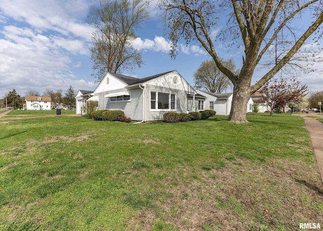 view of home's exterior featuring a lawn