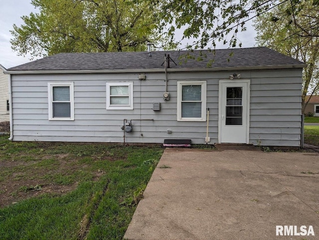 2116 W 68th St, Davenport, IA 52806 - view of front of home featuring a patio area and a shingled roof