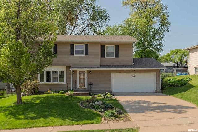 2619 W 37th St, Davenport, IA 52806 - view of front of house featuring concrete driveway and a shingled roof