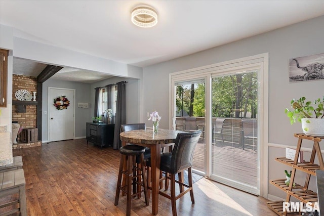 dining room with dark wood-style floors