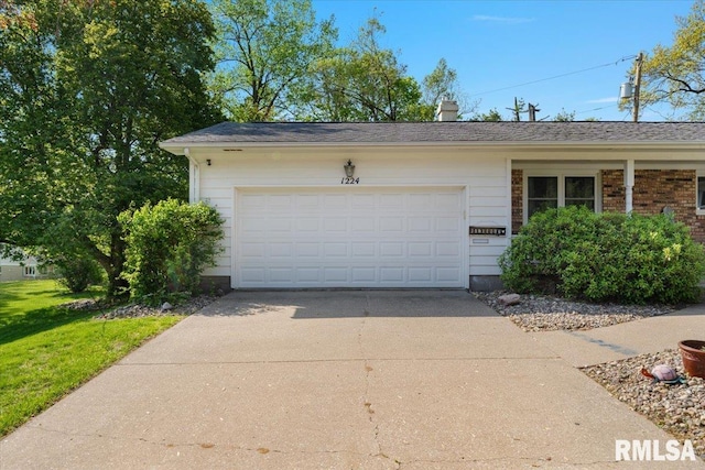 garage with driveway