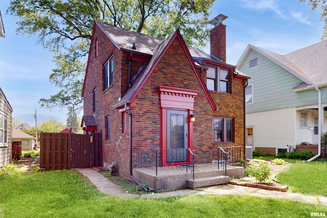 2117 Harrison St, Davenport, IA 52803 - english style home with brick siding and a chimney