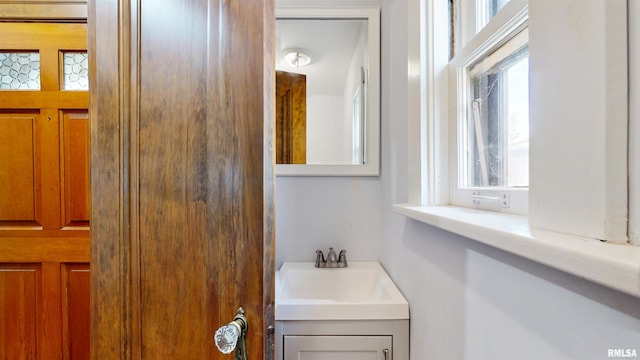 2117 Harrison St, Davenport, IA 52803 - bathroom featuring healthy amount of natural light and vanity