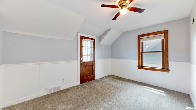 2117 Harrison St, Davenport, IA 52803 - bonus room featuring vaulted ceiling, carpet floors, and ceiling fan
