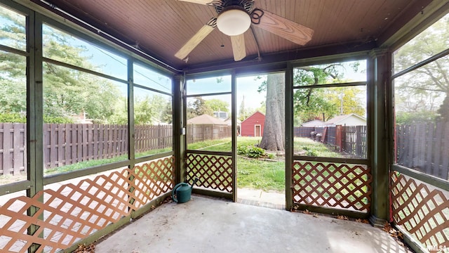 2117 Harrison St, Davenport, IA 52803 - unfurnished sunroom with a ceiling fan