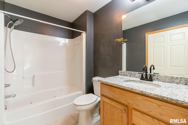 full bathroom featuring tile patterned floors, tub / shower combination, toilet, and vanity