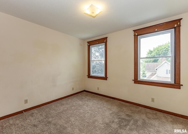 1010 S 6th St, Clinton, IA 52732 - unfurnished room featuring carpet flooring and baseboards