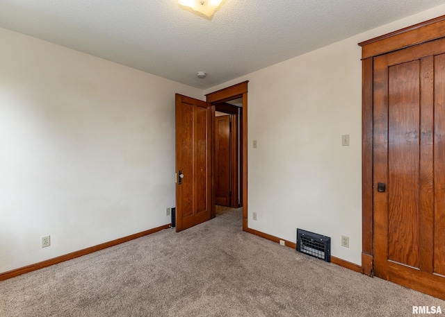 1010 S 6th St, Clinton, IA 52732 - unfurnished bedroom featuring carpet floors and baseboards