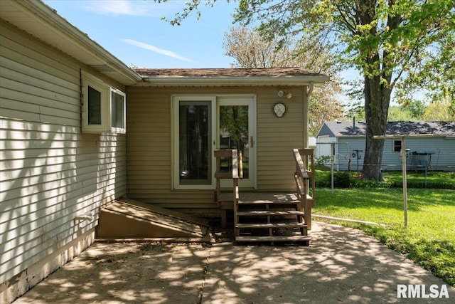 entrance to property with a patio