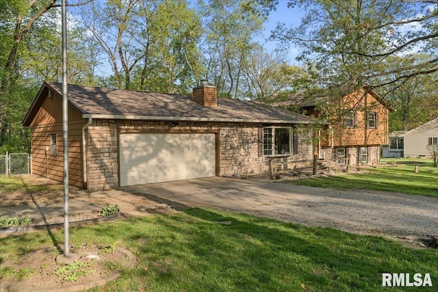 1401 265th St, Sherrard, IL 61281 - view of front facade featuring a chimney, an attached garage, and concrete driveway