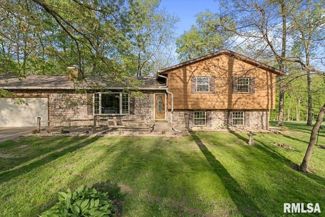 1401 265th St, Sherrard, IL 61281 - view of front facade with a garage, a front lawn, and a chimney