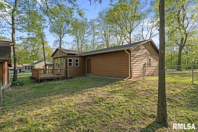 1401 265th St, Sherrard, IL 61281 - back of property with a wooden deck
