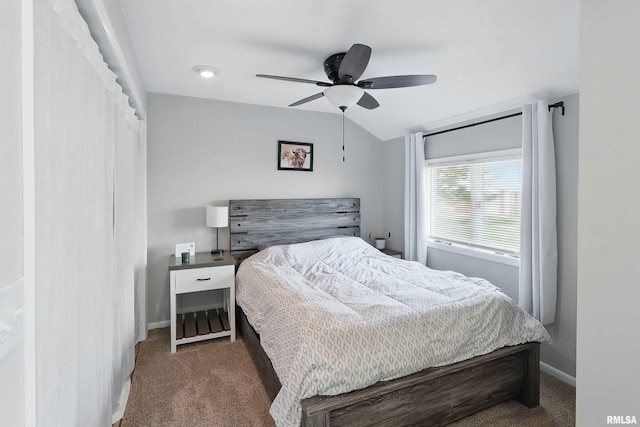 13218 300th St, Donahue, IA 52746 - bedroom with carpet floors, baseboards, a ceiling fan, and lofted ceiling
