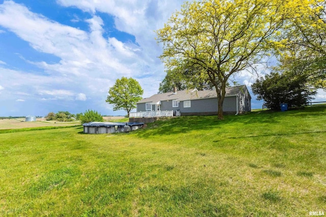 13218 300th St, Donahue, IA 52746 - view of green lawn featuring a covered pool