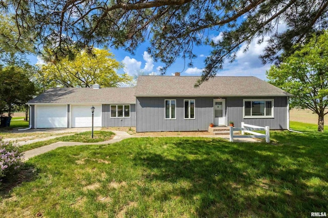 13218 300th St, Donahue, IA 52746 - ranch-style home with a front yard, an attached garage, and roof with shingles