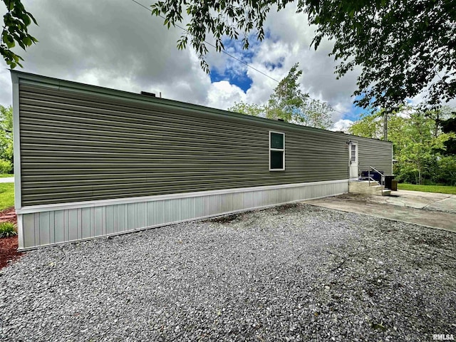 806 Boyd St, Eldorado, IL 62930 - view of property exterior featuring a patio area and entry steps