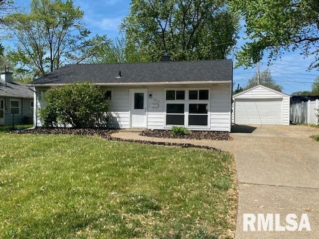 2712 30th St, Rock Island, IL 61201 - ranch-style home with a garage, an outbuilding, and a front yard