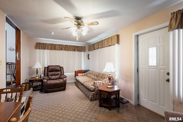 6868 Rte 37, Marion, IL 62959 - living room featuring a ceiling fan, carpet, and baseboards