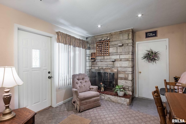 6868 Rte 37, Marion, IL 62959 - carpeted living area with a fireplace