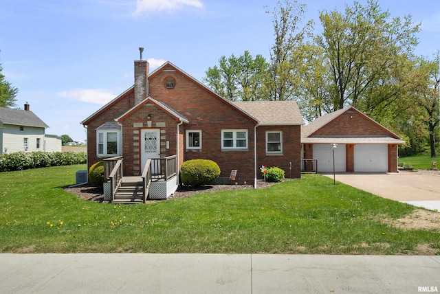 view of front of house featuring a chimney, a front lawn, brick siding, and an outdoor structure