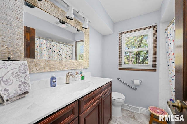 full bathroom with vanity, toilet, baseboards, tile patterned floors, and a shower with shower curtain