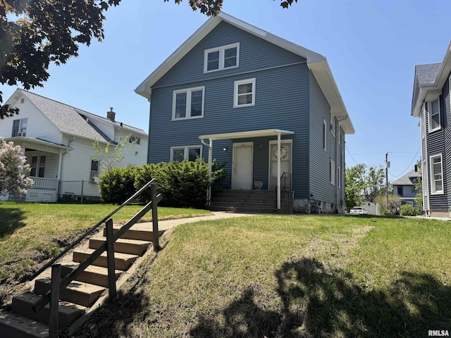 traditional style home featuring a front lawn