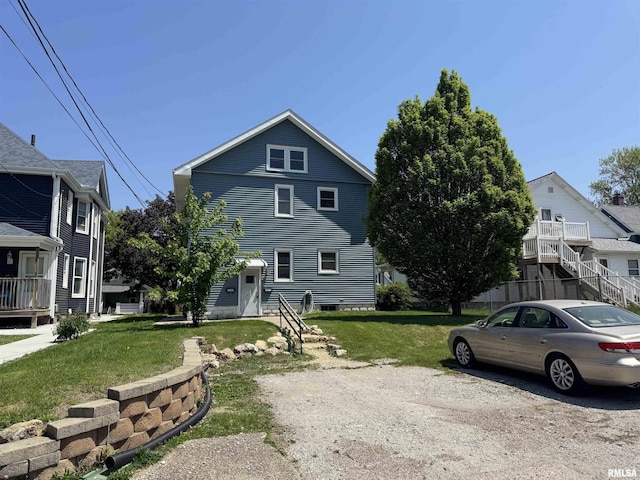 view of front of home with a front yard
