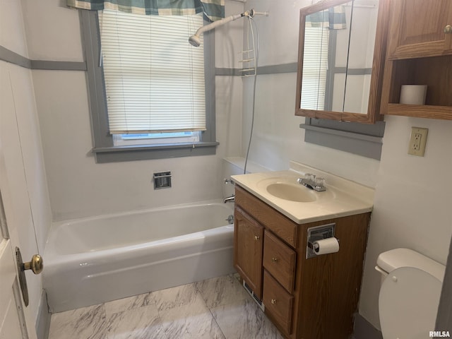 full bath with vanity, toilet, washtub / shower combination, and marble look tile flooring