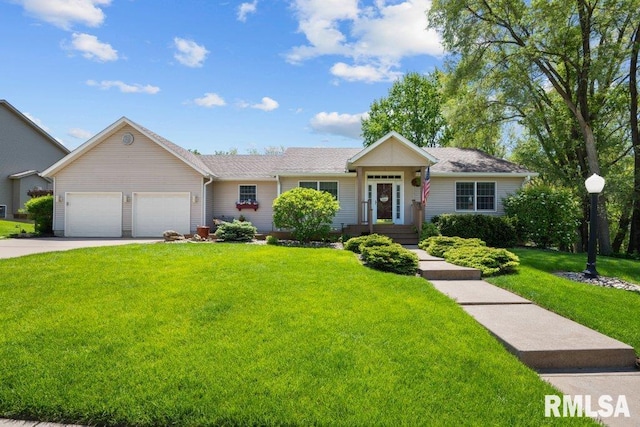 77 Park View Dr, Eldridge, IA 52748 - single story home featuring a front lawn, an attached garage, and concrete driveway