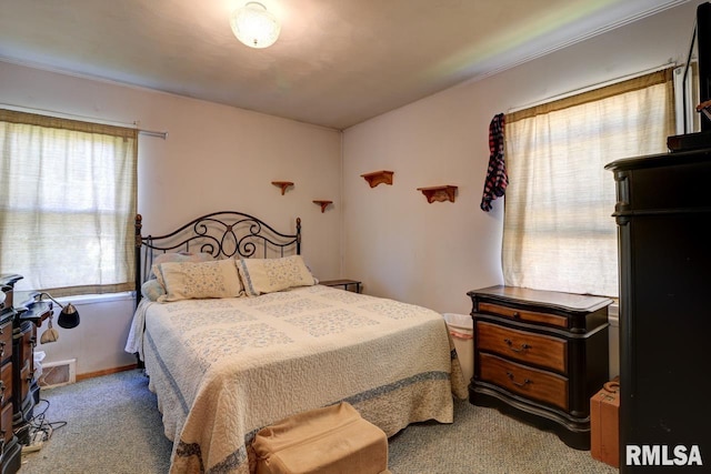bedroom featuring carpet