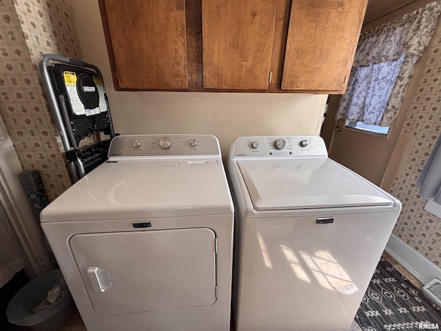 451 S Grove St, Kewanee, IL 61443 - laundry area featuring separate washer and dryer and cabinet space