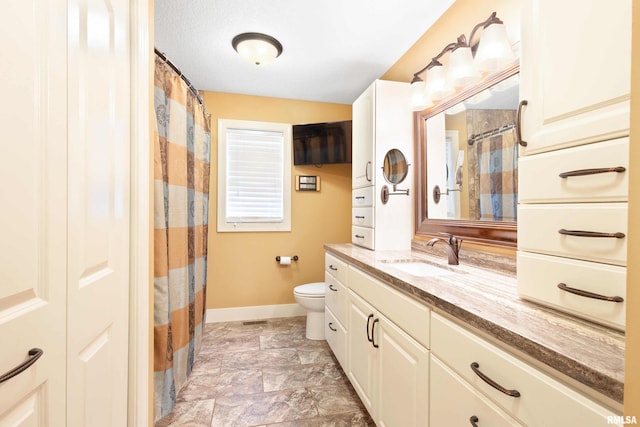 24711 178th St, Pleasant Valley, IA 52767 - full bath featuring vanity, baseboards, toilet, and a shower with shower curtain