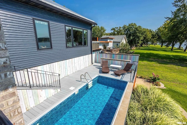 24711 178th St, Pleasant Valley, IA 52767 - view of swimming pool with a deck and a lawn